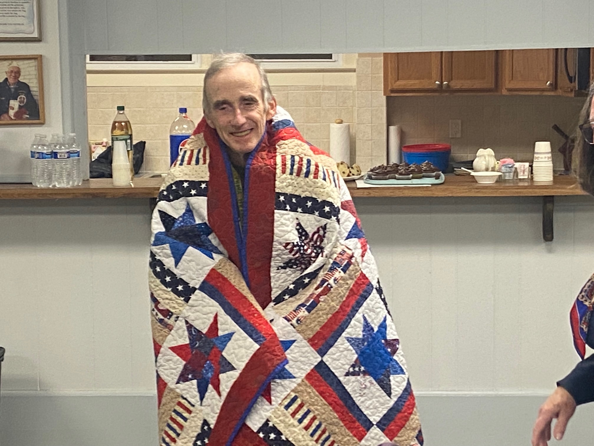 Pete Cullen wrapped in his quilt